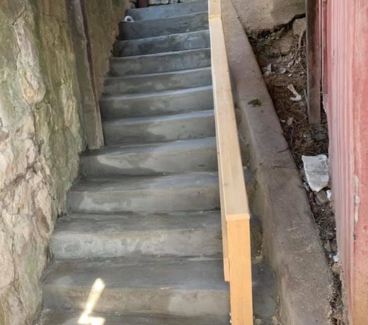 Concrete overlay with handrails for adults and kids